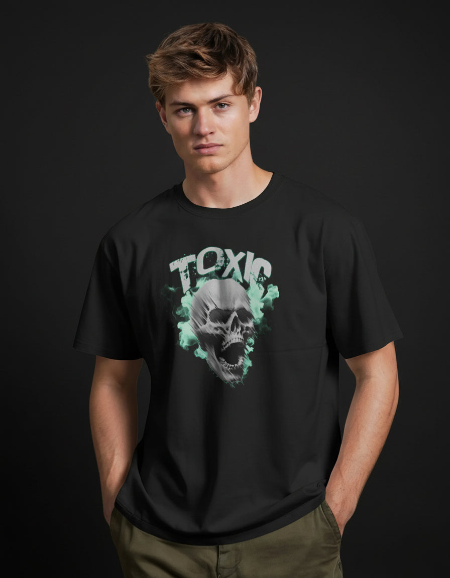 Person wearing a black t-shirt with a skull graphic and 'TOXIC' text on an orange background